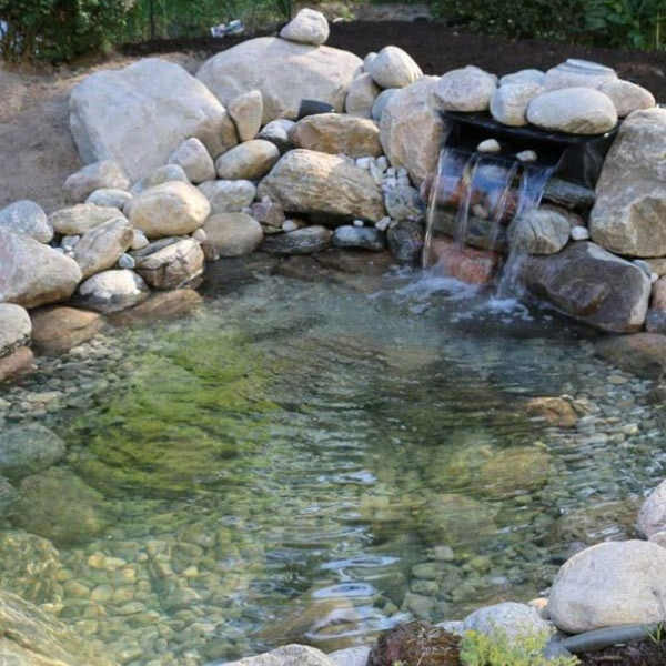 Creative Backyard Ponds Ideas With Waterfalls To Try 16