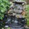 Creative Backyard Ponds Ideas With Waterfalls To Try 17