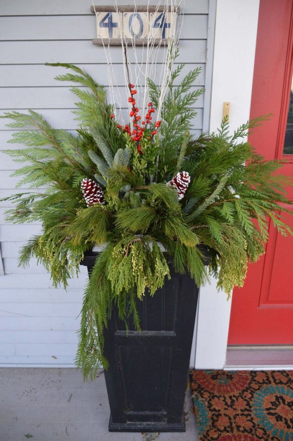 Marvelous Outdoor Holiday Planter Ideas To Beauty Porch Décor 23
