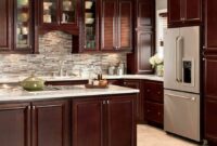 Kitchens With Cherry Cabinets And Black Countertops